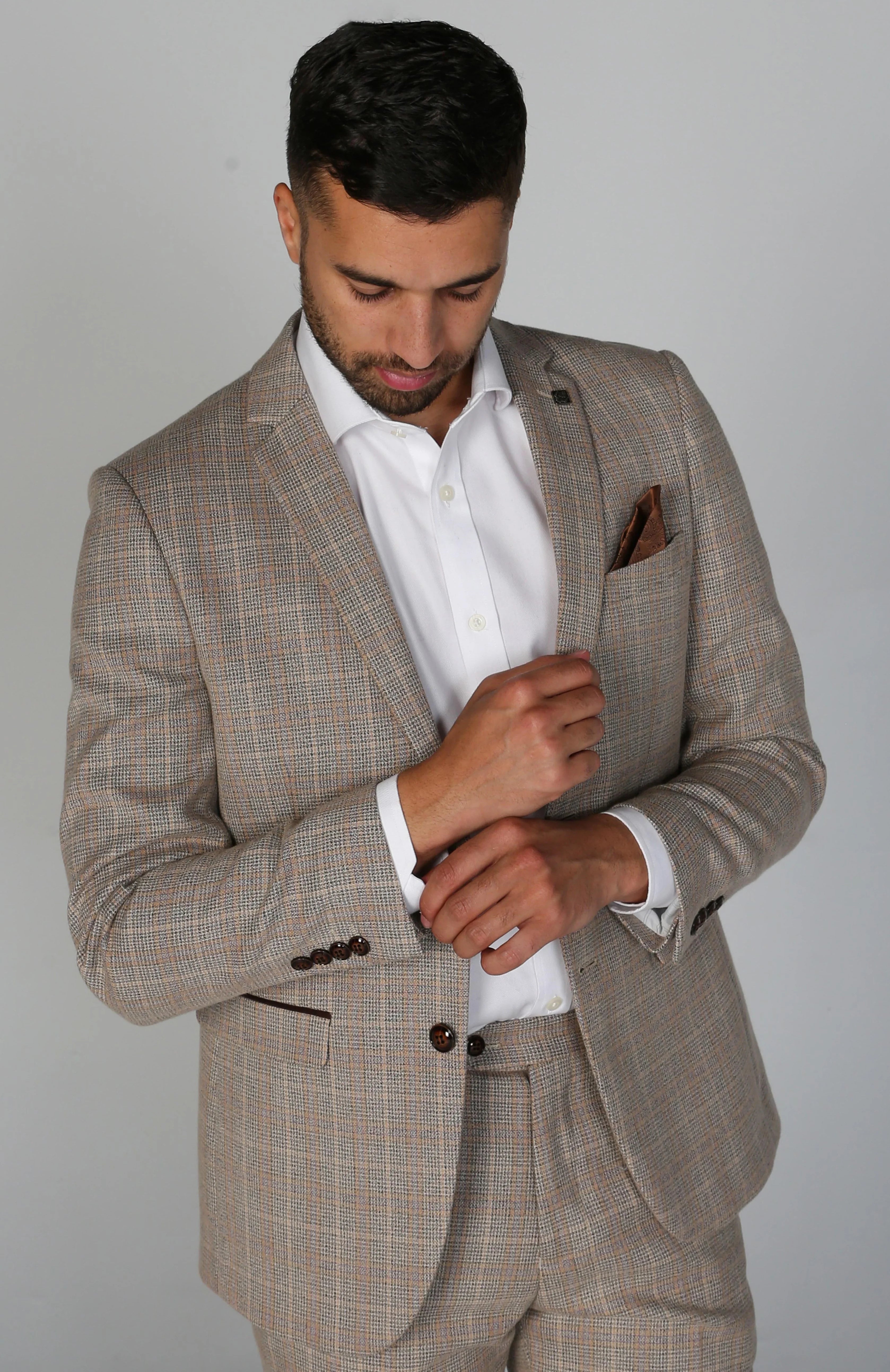 Down - filled men jackets in bright colors for winter fashion Waterproof men coats with taped seams for heavy rain and snow days Holland - Tweed Check Blazer Down - filled men jackets in bright colors for winter fashion Waterproof men coats with taped seams for heavy rain and snow days Holland - Tweed Check Blazer