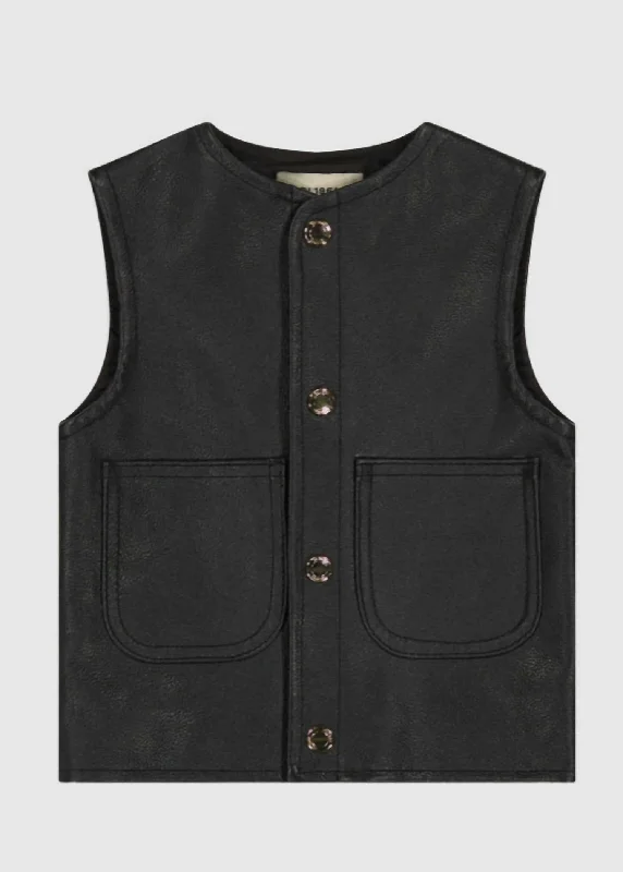 Men jackets with a zip - off sleeves to convert to a vest Camouflage men coats for outdoor enthusiasts and hunters Vicki Vest In Obsidian Men jackets with a zip - off sleeves to convert to a vest Camouflage men coats for outdoor enthusiasts and hunters Vicki Vest In Obsidian