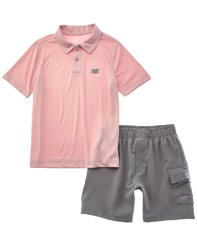 Lightweight men jackets made from recycled nylon for eco - friendly travel Men coats with a contrasting trim for a fashion - forward aesthetic New Balance 2pc Polo Shirt & Woven Short Set