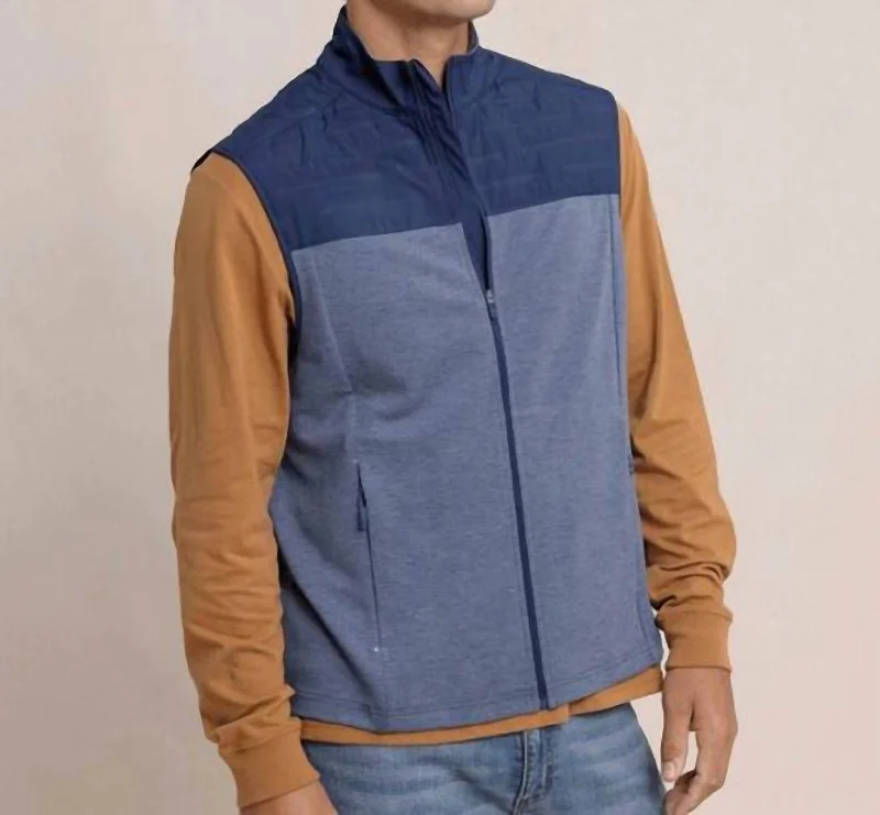 Men jackets with a built - in hood that can be stowed away when not in use Men coats with a hooded design for added protection against the elements Coligny Quilted Vest In Dress Blue Men jackets with a built - in hood that can be stowed away when not in use Men coats with a hooded design for added protection against the elements Coligny Quilted Vest In Dress Blue