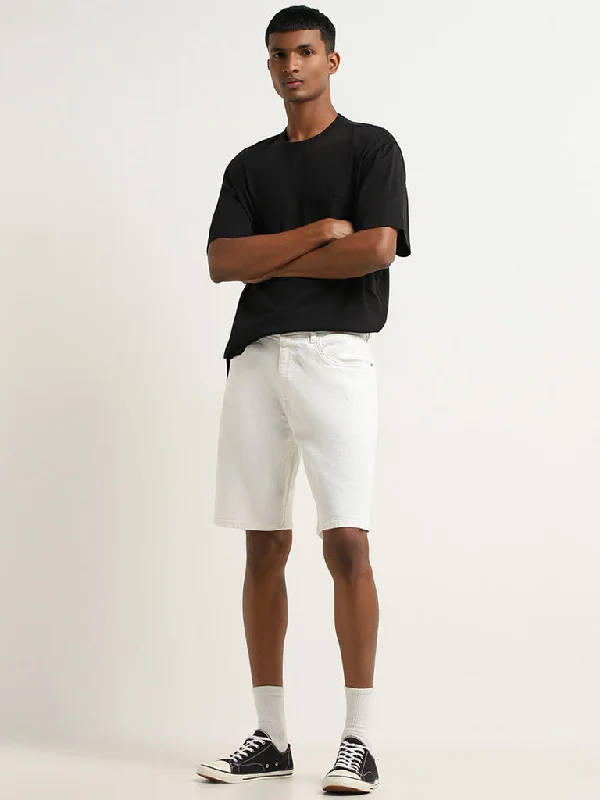 Men's denim shorts with a ripped - knee detail for a rebellious look Nuon Off-White Relaxed-Fit Mid-Rise Denim Shorts Men's denim shorts with a ripped - knee detail for a rebellious look Nuon Off-White Relaxed-Fit Mid-Rise Denim Shorts