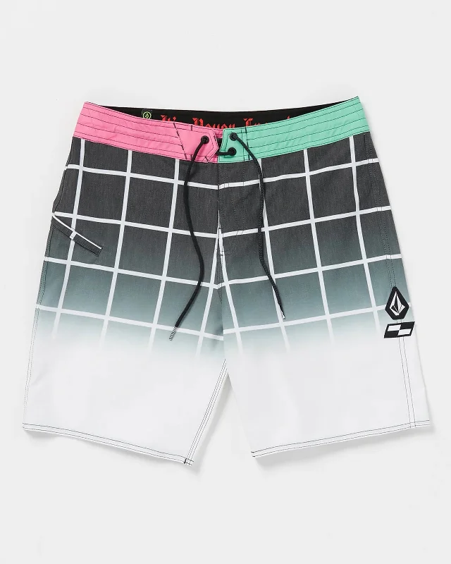Men's camo print cargo shorts for outdoor adventures  Schroff X Volcom Stoney Trunks