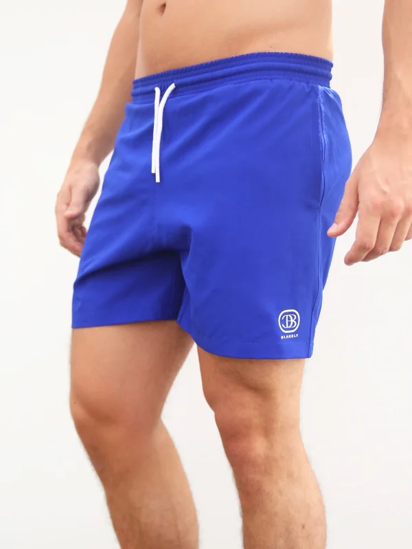 Men's camo print cargo shorts for outdoor adventures  Initial Swim Shorts - Blue