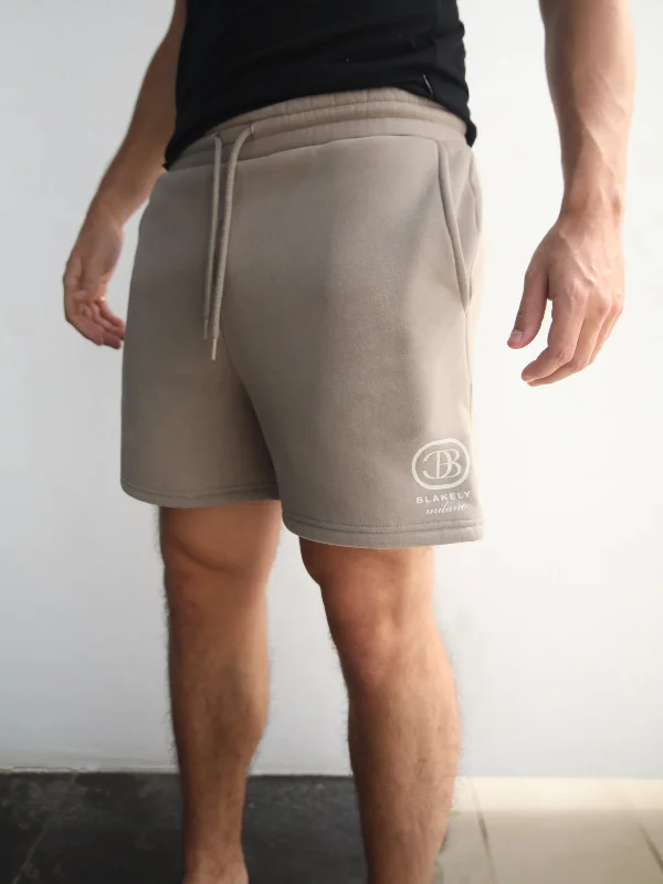 Men's ripped denim shorts for a trendy streetwear aesthetic Milano Relaxed Jogger Shorts - Light Brown Men's ripped denim shorts for a trendy streetwear aesthetic Milano Relaxed Jogger Shorts - Light Brown