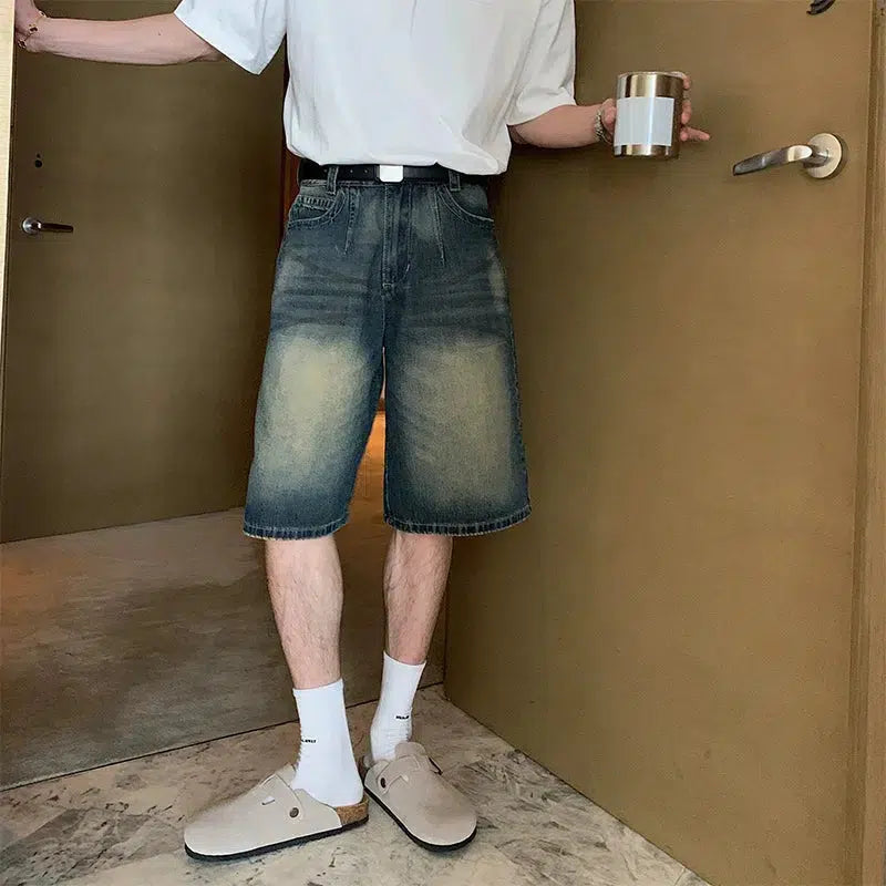 Men's denim shorts with a ripped - knee detail for a rebellious look Loose-fit Denim Shorts Men's denim shorts with a ripped - knee detail for a rebellious look Loose-fit Denim Shorts
