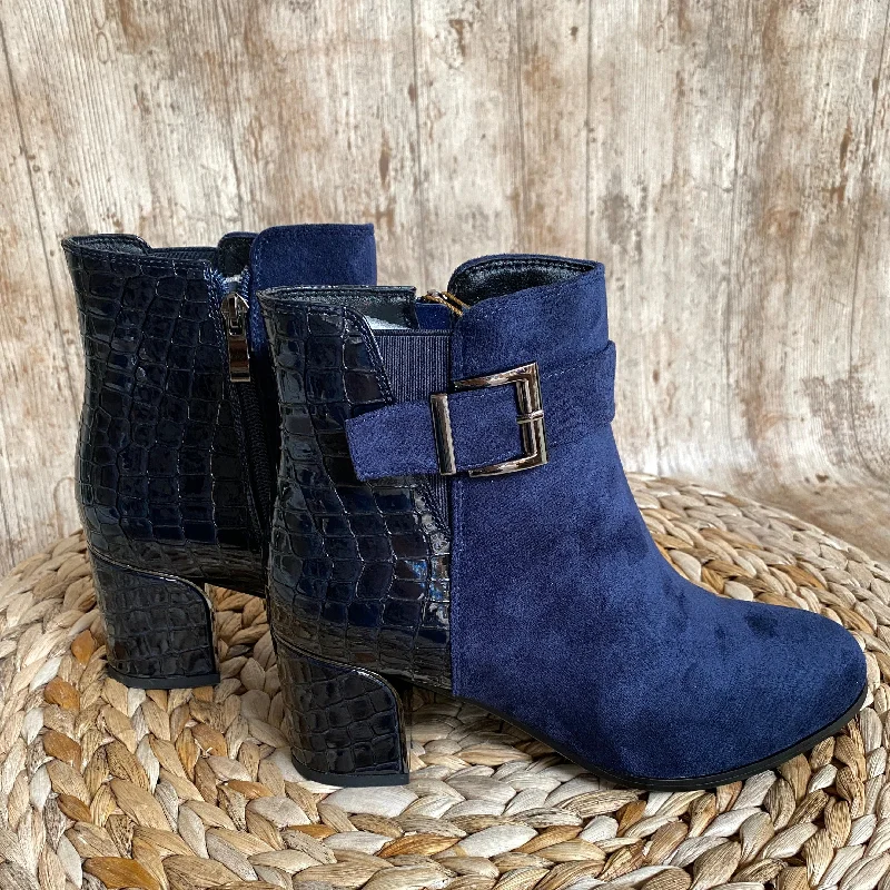 Women's fashion - forward winter boots with a unique design Europa Heeled Ankle Boot Women's fashion - forward winter boots with a unique design Europa Heeled Ankle Boot